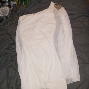 a one shoulder white dress